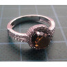 Silver ring with amber colored center stone and white zircon side stones_1368