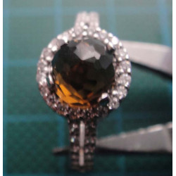 Silver ring with amber colored center stone and white zircon side stones_1368