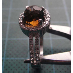 Silver ring with amber colored center stone and white zircon side stones_1368