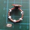 Rose gold colored clover motif black stone evil eye beaded ring_1392